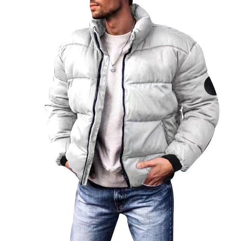 Chaqueta acolchada de algodón de invierno para hombres nuevos transfronterizos Abrigo acolchado de algodón con cuello de pie simple Chaqueta acolchada de algodón imprimible de color sólido engrosada