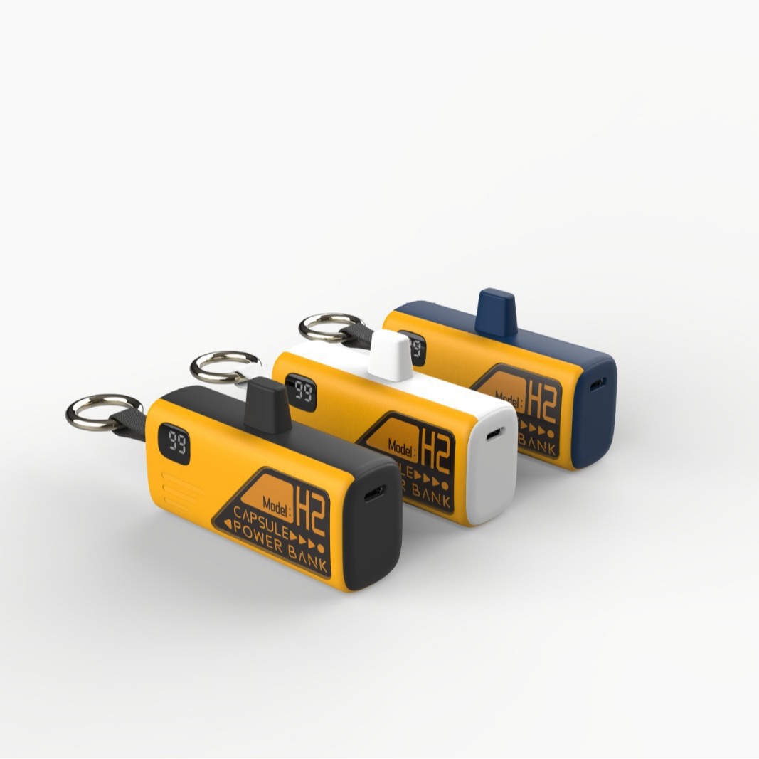 Nuevo modelo privado de puerto de carga plegable cápsula de carga 5000 mAh portátil enchufe de cola de emergencia generación de energía móvil