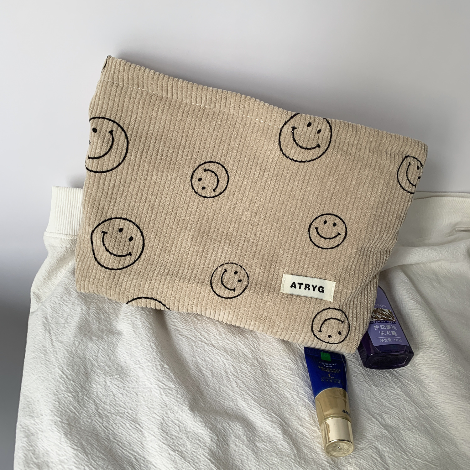 Bolsa de cosméticos de pana de lunares de lona transfronteriza, almacenamiento de cara sonriente, bolso de mano de lavado, llave, billetera móvil, estuche para lápices
