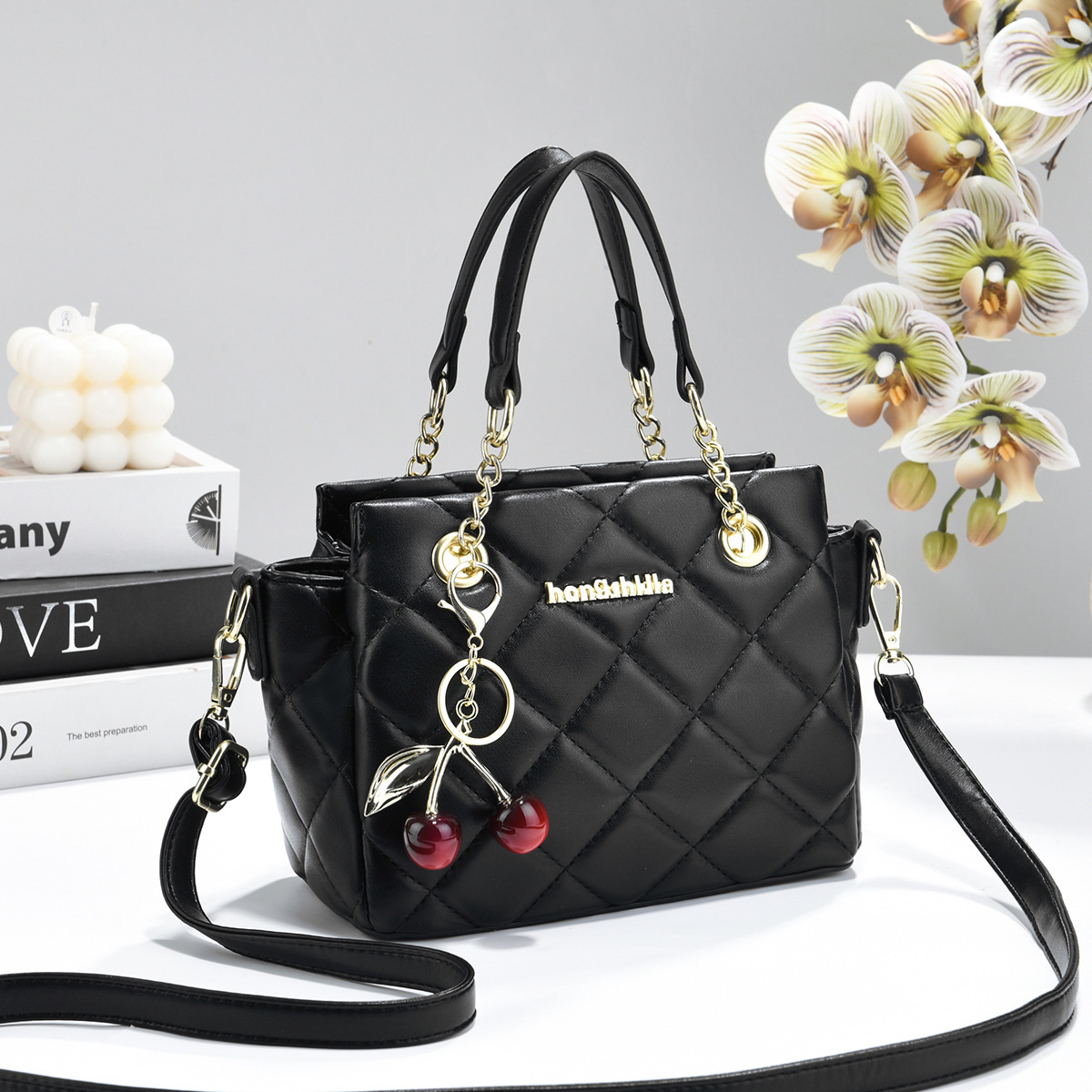 2026 nuevo estilo de fragancia bolso de mujer estilo de moda mochila de hombro de viaje versátil bolso de cubo al por mayor