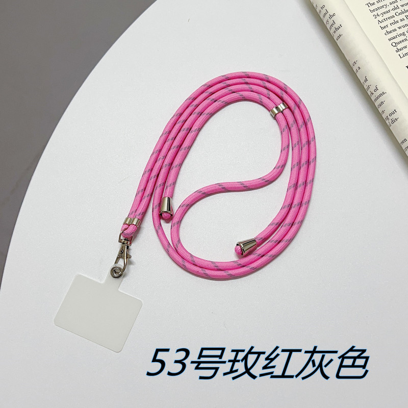 携帯ケースにナイロンのストラップが貼られています。|undefined