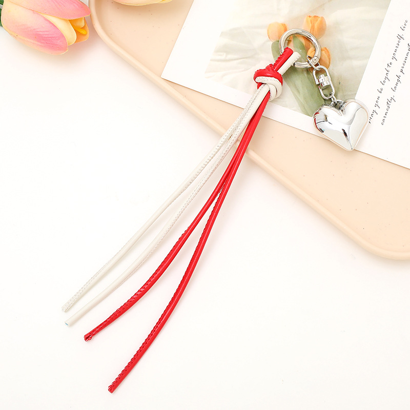 Nuevo tipo de cuerdas de cuero PU llavero colgante in bolsos de moda colgante cadena accesorios DIY tejido a mano