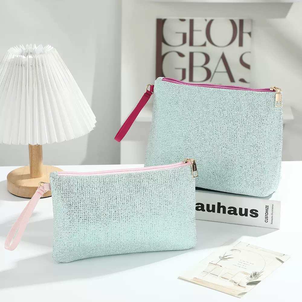 工厂定制新款时尚亮片手拿化妆包零钱口红彩妆纯色简约旅行收纳包