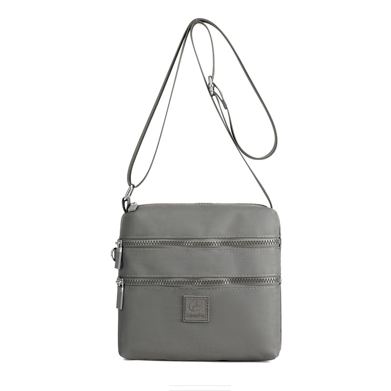 Bolsos de tela pequeños al por mayor, bolsos de nylon, bolsos de hombro para mujeres, tendencia coreana, mochilas ligeras al aire libre, bolsos de tela prácticos de varias capas