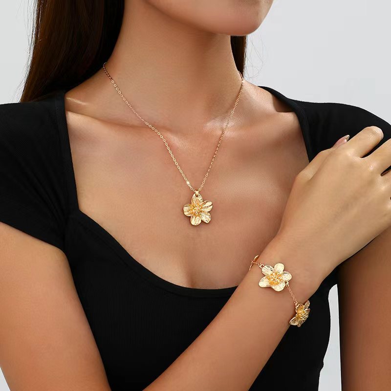 Europa y los Estados Unidos moda transfronteriza venta caliente flor simple personalidad universal mujer raqueta de calle conjunto de decoración joyas de moda
