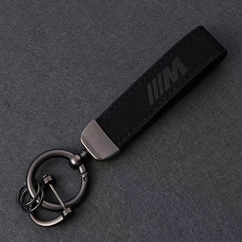 Foreign trade suede car keychain with car logo and model, exquisite leather car keychain accessories Foreign trade suede car keychain with car logo and model, exquisite leather car keychain accessories