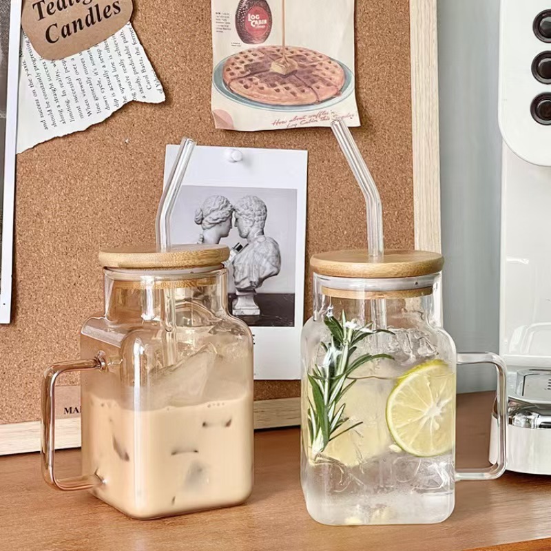 Nuevo producto Taza de paja cuadrada especial Vaso de vidrio con tapa de borosilicato Taza de jugo Gran capacidad y mango de alto valor