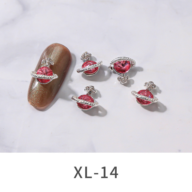 2021 Nueva joyería de Planeta de aleación de uñas popular transfronteriza brillante multicolor Luz de lujo incrustado en diamante uñas decoración de cielo estrellado