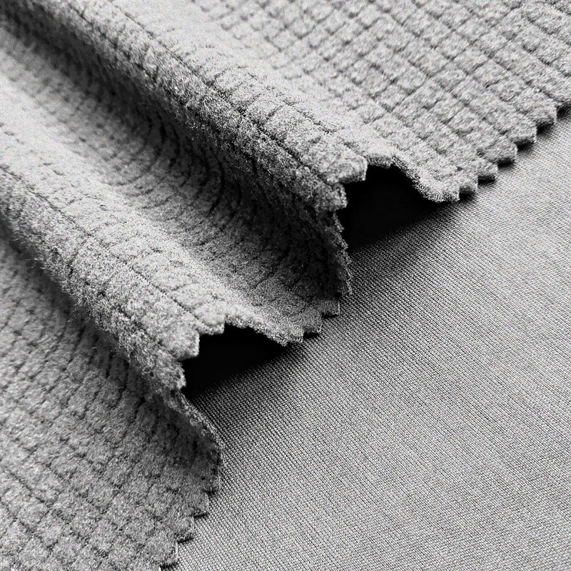 现货防泼水远红外复合摇粒绒三合一防水透气软壳冲锋衣夹克面料