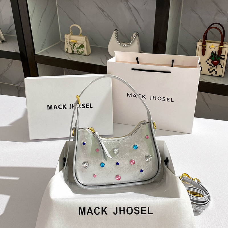De una sola pieza de entrega nicho de diseño rhinestone de plata axila bolsa 2023 nuevo hombro de alta calidad crossbody baguette bolsa al por mayor