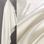 乳白色亮光液态水光缎面料 光滑反光礼服仿真丝裙子裤子服饰布料