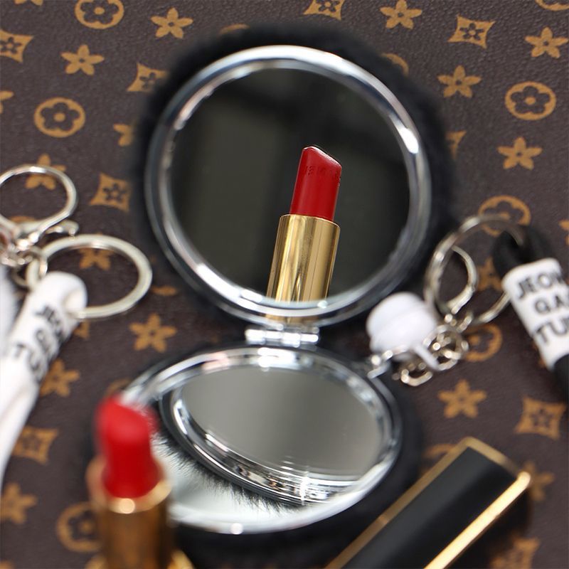 Luz de lujo pequeño viento de peluche colgante espejo bolso colgante espejo de maquillaje llavero plegable con espejo de doble cara a prueba de pérdida