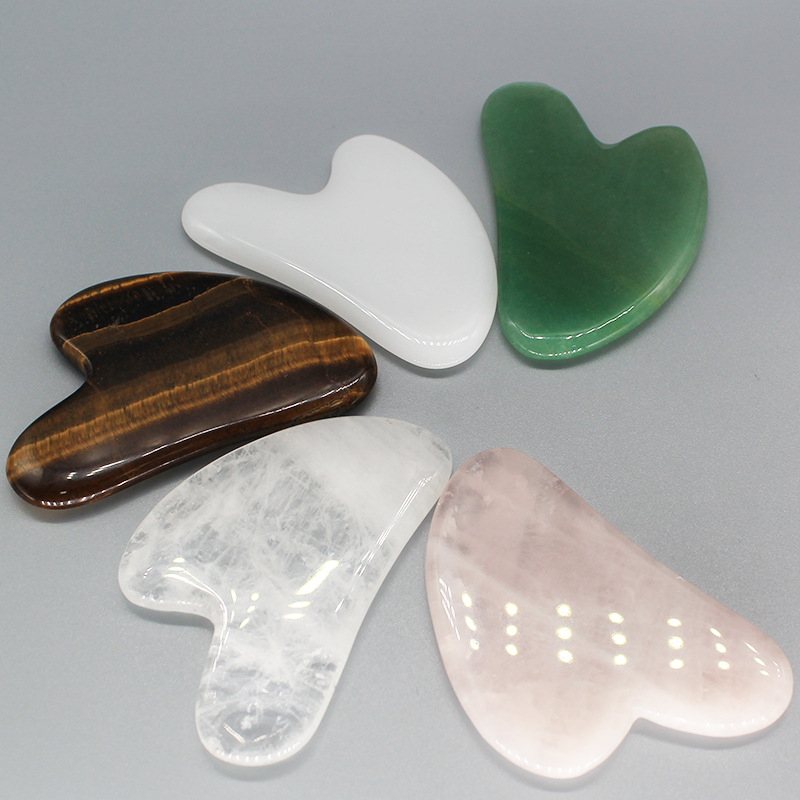 Tablero raspador de jade de cristal rosa natural Tablero raspador de belleza facial de cristal Meridian