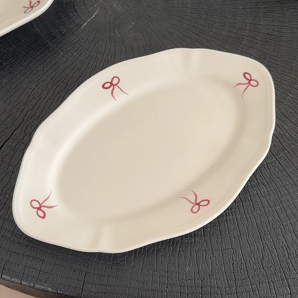 Large purple -red bow oval disc