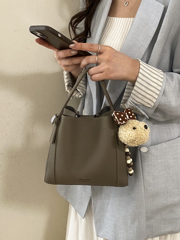 Nicho coreano litchi pattern bolso de cubo de mano mujer comercio exterior nueva moda alta textura ligera lujosa bolsa de mochila