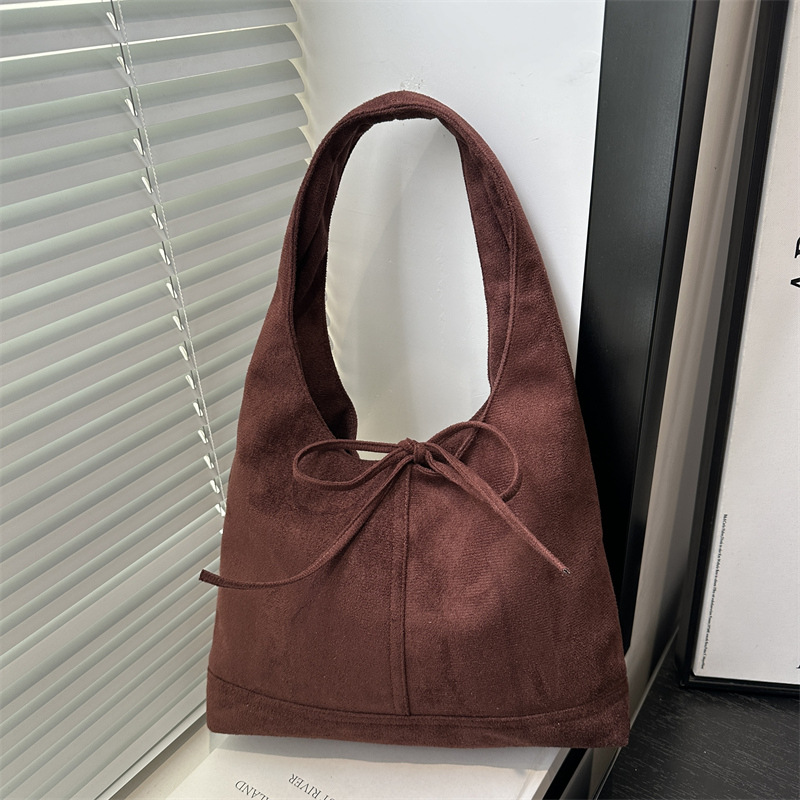 Lazos de nicho coreano estilo de moda ocio retro gamuza viaje de hombro único arco axilar bolsa de moda