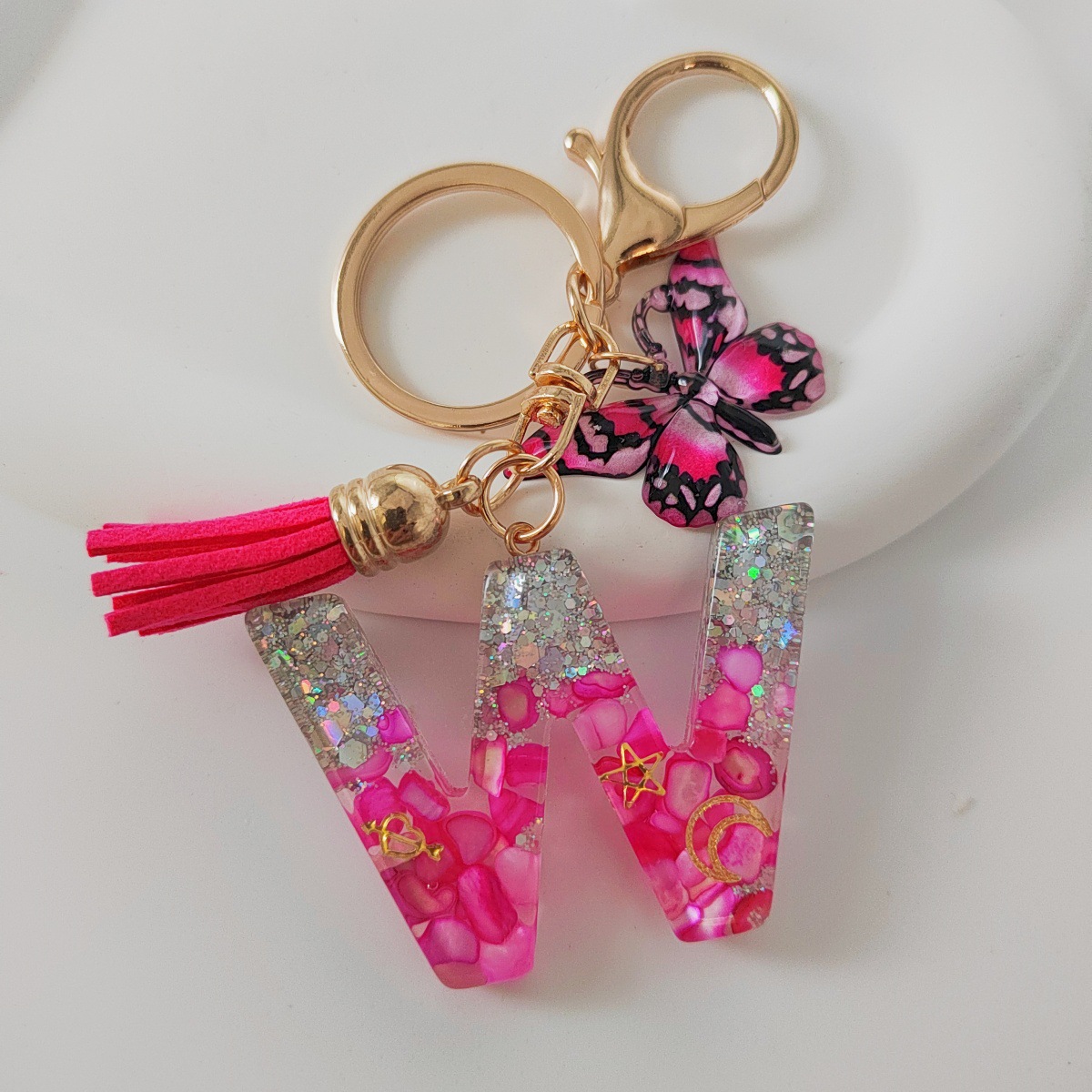 Inventario transfronterizo nueva resina bicolor mariposa borda llavero colgante estrella luna accesorios de joyas