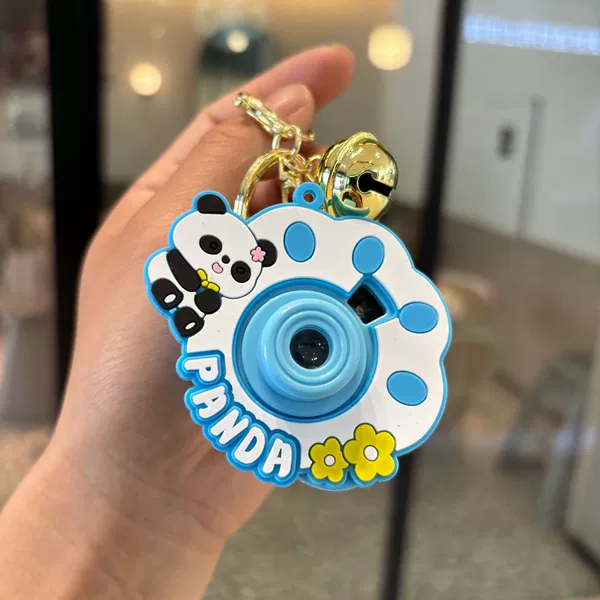 Camera, blue keychain