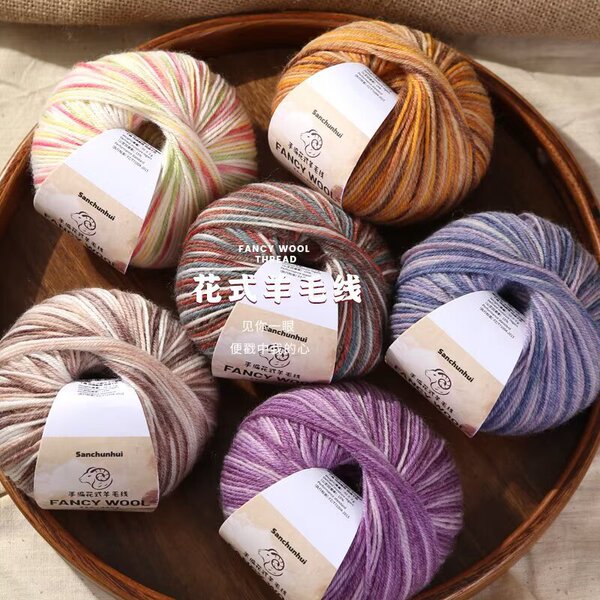 Rainbow woolen ball of yarn