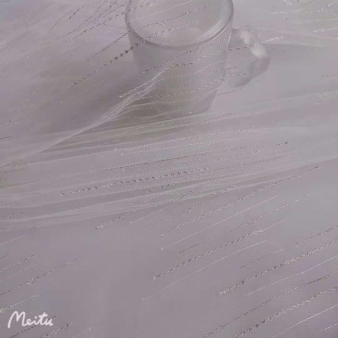 【现货供应】新款锦纶薄透小段细条点点串三彩七彩丝提花网纱面料