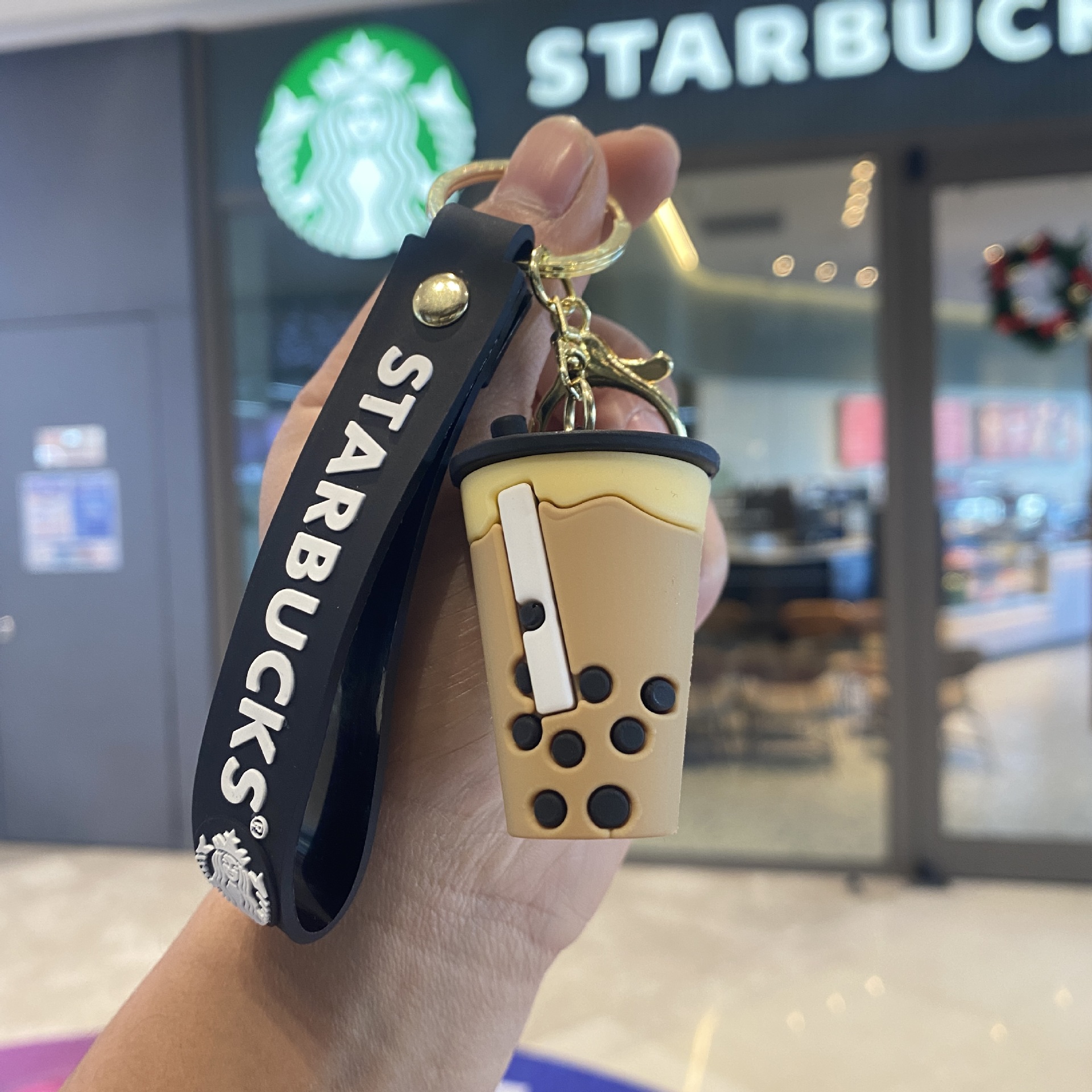 Cruz-frontera Starbucks leche taza llavero muñeca máquina pequeña bolsa de regalo accesorios regalo de Año Nuevo al por mayor