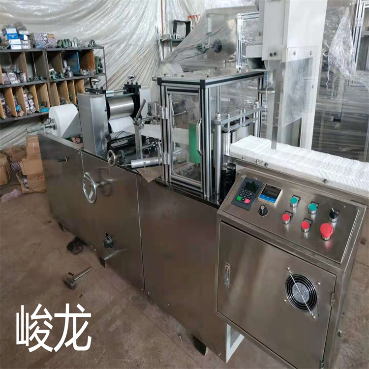 现机无纺布毛巾折叠机，一次性足浴巾设备，美容床单裁切机全自动