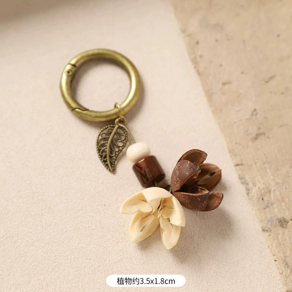 20-Brown and white smile (bag pendant)