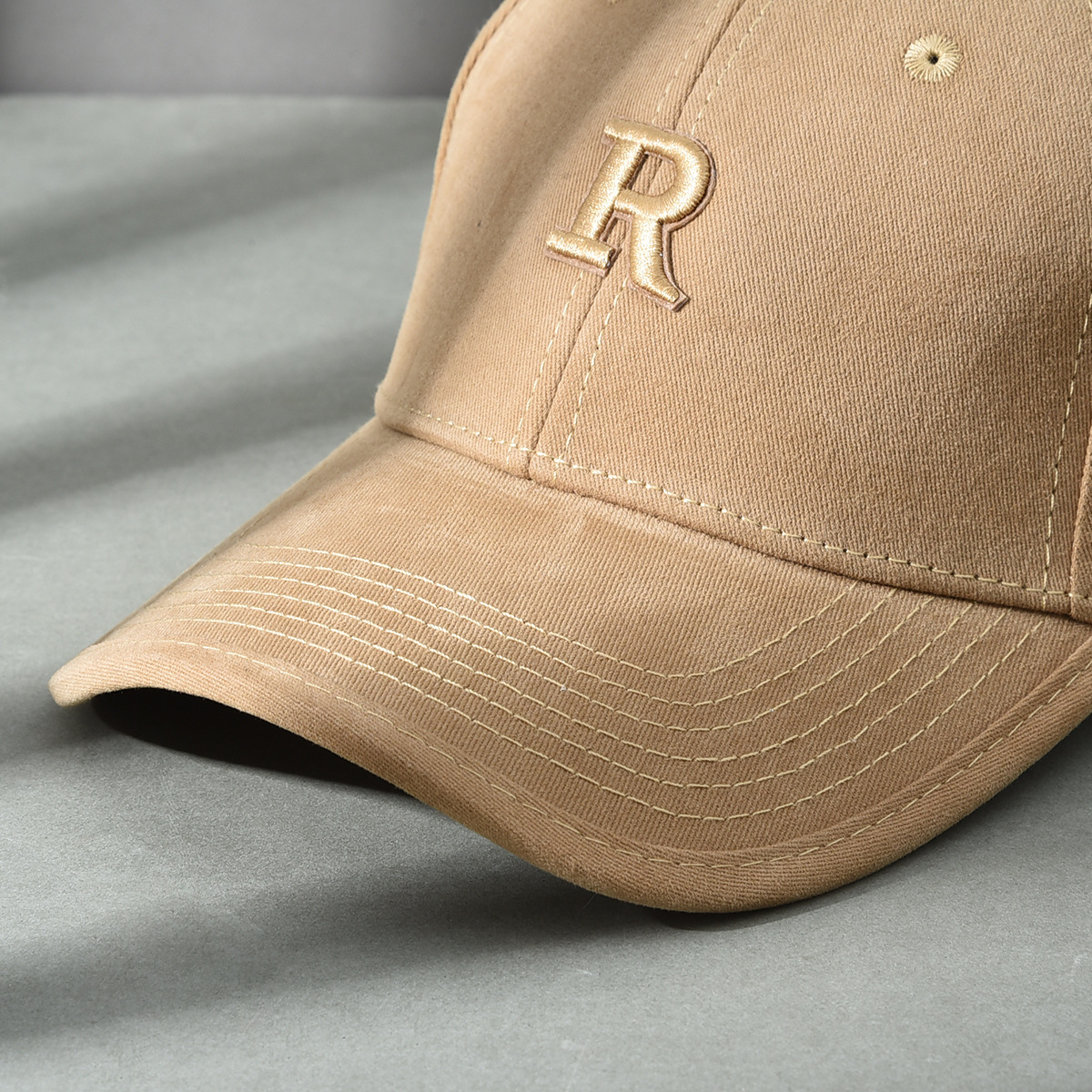 Versión de elevación R sombrero de estilo coreano sombrero de béisbol molido sombrero de béisbol de otoño y invierno sombrero de boca de pato cara pequeña