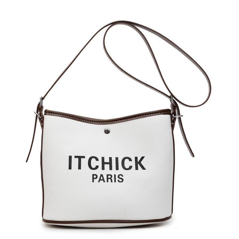 Transfronterizos de gran capacidad bolso de cubo portátil de tela de mujer impresión de letras de moda alta textura versátil mochila