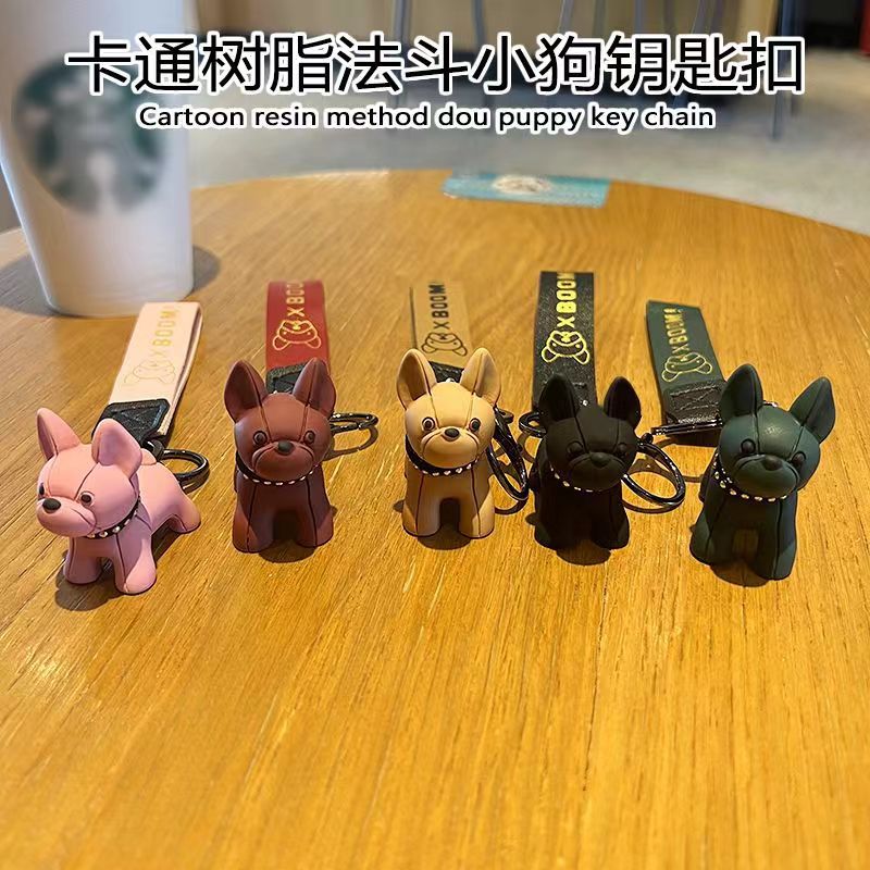 Creativo, colorido, violento, muñeca de oso de dragón, método de lucha de perros, llavero de muñeca de moda, llavero de personalidad de coche