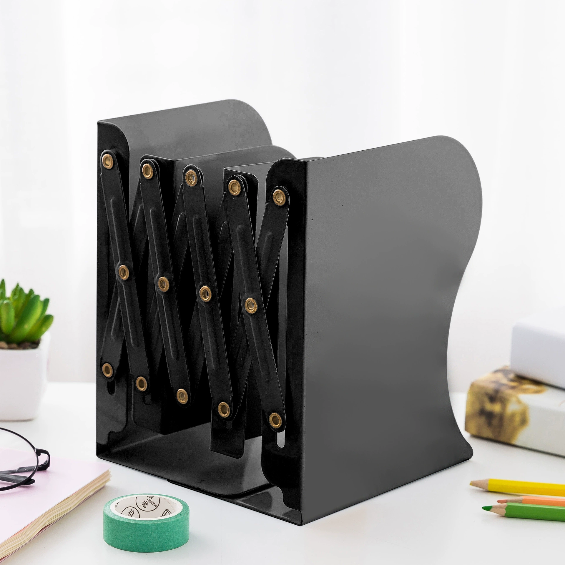 Factory direct sales explosion creative stationery supplies telescopic book holder folding book frame metal students cartoon