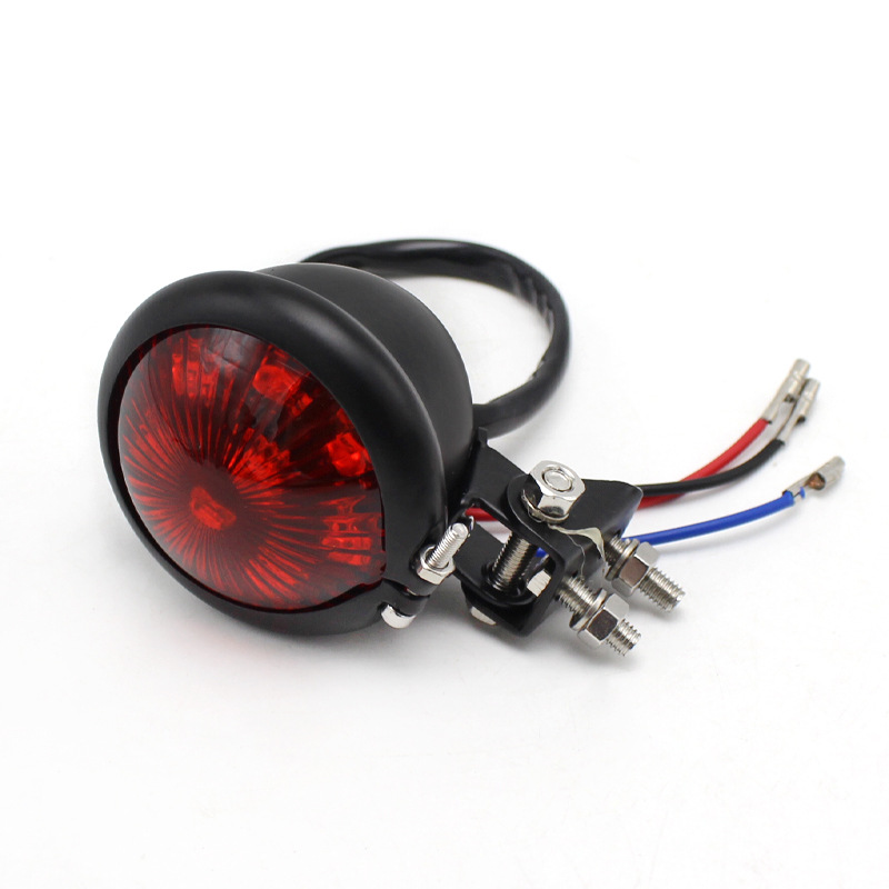 Accesorios de la motocicleta retro modificado crucero Príncipe locomotora metal redondo pequeña luz trasera luz freno LED Universal