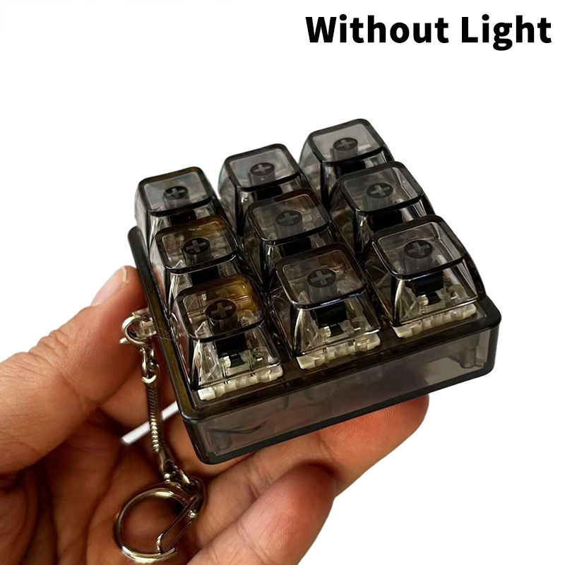 nine-key-pressure-reducing-toy-keychain-pendant-for-testing-axis-fingertip-press-to-add-light-toy