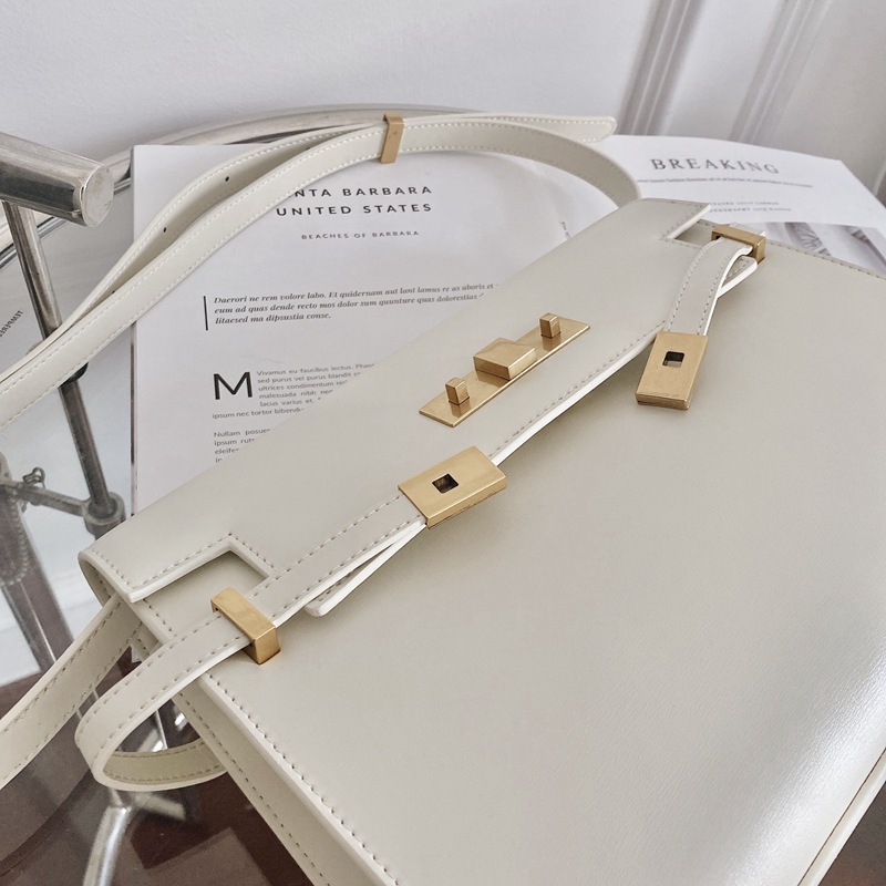 Yang Shulin Manhattan Kelly bolso de cuero 2025 nuevo bolso de mensajero portátil de cuero de alta gama de gran marca