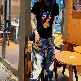 夏季卡通涂鸦印花休闲宽松黑色显瘦圆领短袖女装百搭休闲个性时尚