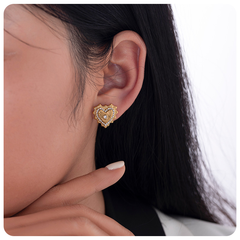 Taina europa 18k oro verdadero electro galvanizado de acero de moda viento de viaje irradiando luz amor aretes de acero inoxidable al por mayor