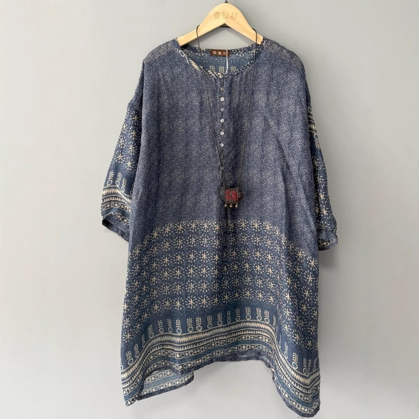 Thin summer shirt with a round collar