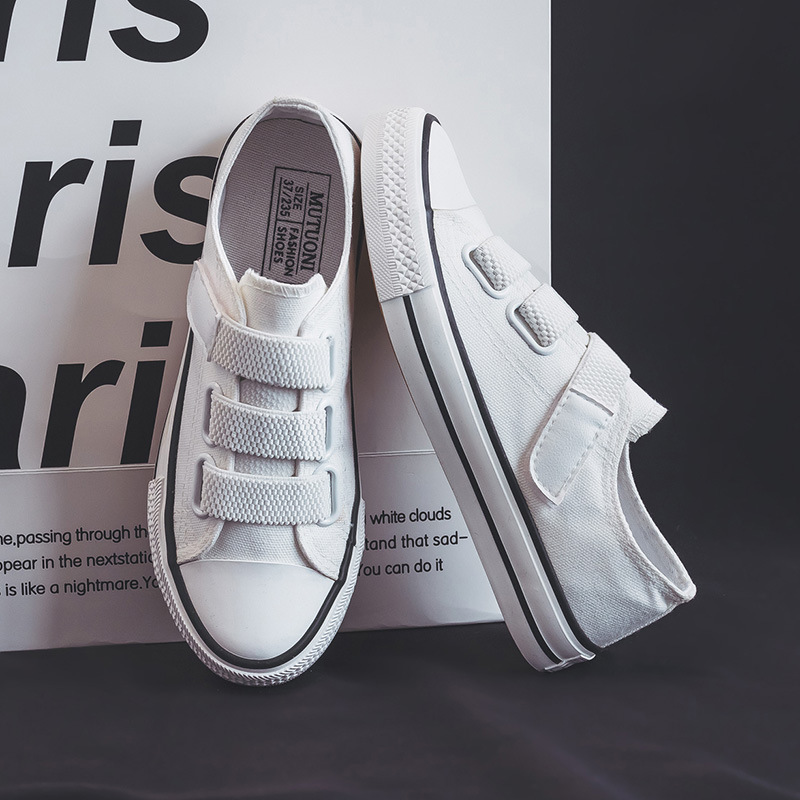Zapatos de lona bajos de estilo coreano para mujer 2024 Primavera Nueva hebilla zapatos blancos mocasines para estudiantes zapatos de goma vulcanizada zapatos de tela