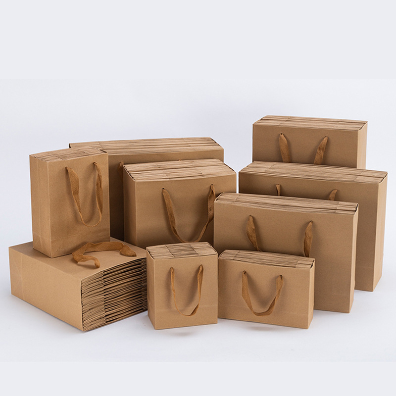 Bolsa de papel kraft gruesa empaquetada bolsa de mano cuadrada al por mayor ropa de gran tamaño bolsa de compras de mano bolsa de regalo de mano