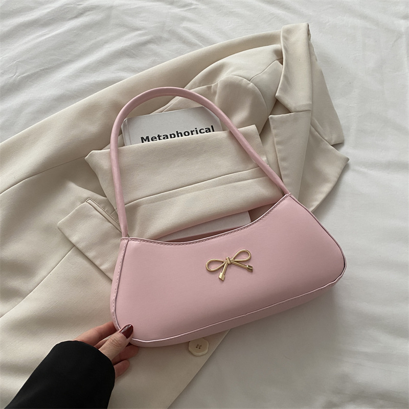 Bolso de axila con lazo para mujer 2025 nuevo bolso de bola de masa de lujo simple y ligero de alta calidad textura bolso de mensajero de un solo hombro marea