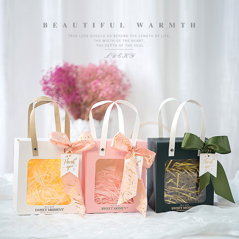 Bolsa de papel de ventana al por mayor estilo ins bolsa de papel de tamaño pequeño bolso de regalo de mano bolso de regalo transparente bolsa de regalo de tarjeta blanca