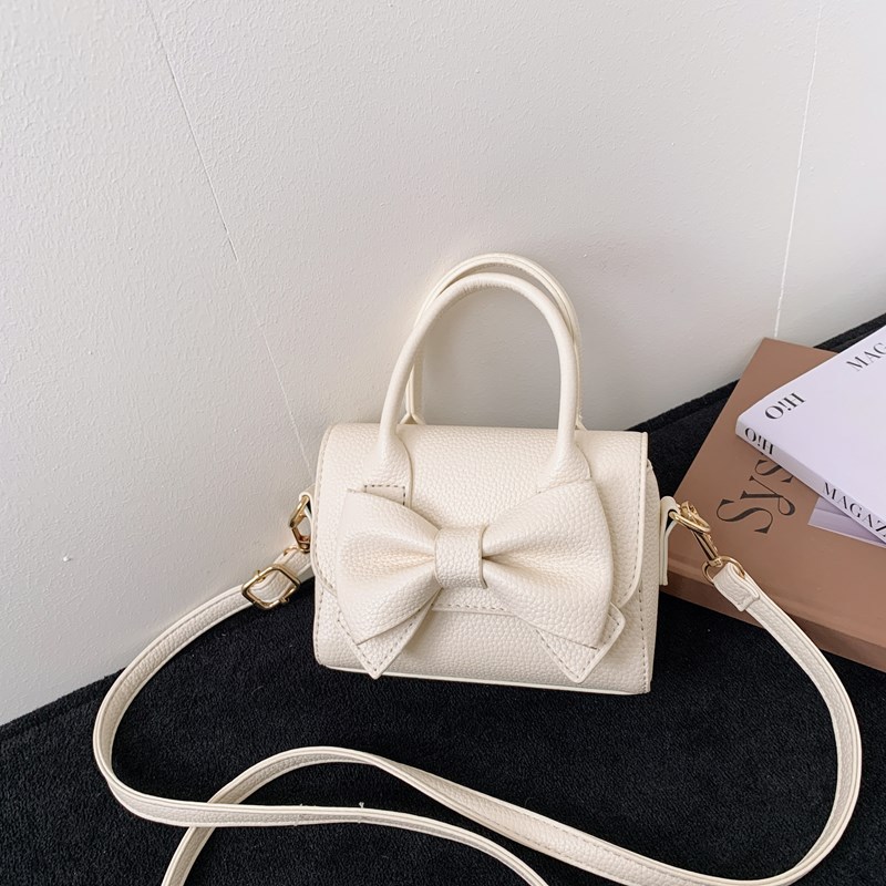 Bolsos infantiles, bolsos de niña transfronterizos, bolsos de hombro de moda coreana para niñas, bolsos portátiles de princesa.