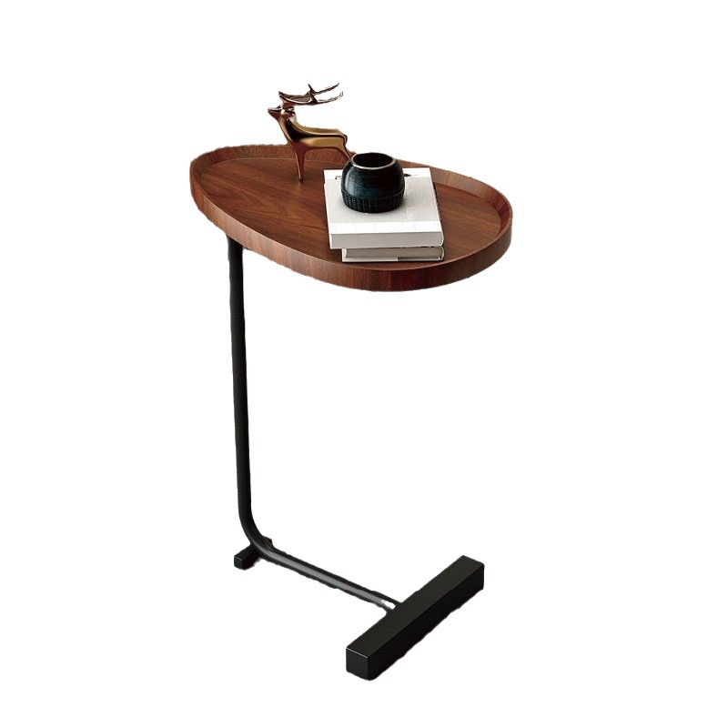Dormitorio de lujo ligero al lado de la cama varias mesas móviles al lado de la cama pequeña esquina de la sala de estar sofá mini mesa de té