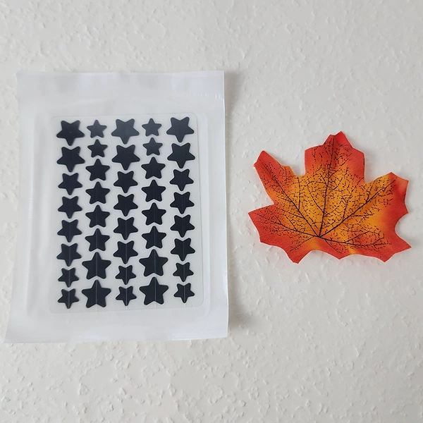 Black 40 tablets paper plastic bag