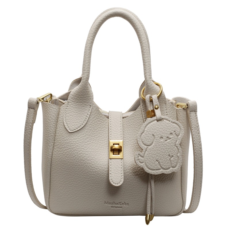 Este año, la popularidad de la bolsa de cubo para mujeres de alta calidad 2025 nuevo bolso casual de moda, bolso de hombro de moda