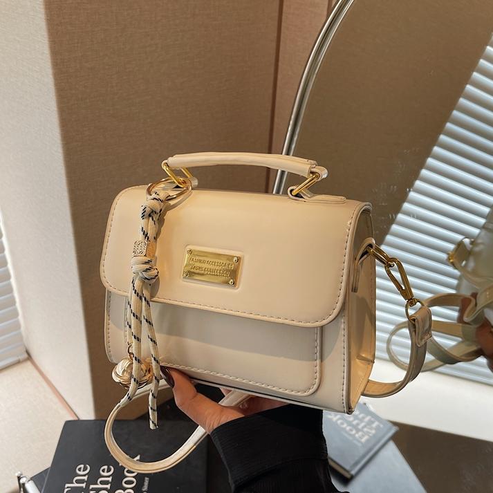 Simple y popular bolso de mano 2025 nuevo estilo de moda retro bolso de hombro coreano alta sensación mochila de mujer