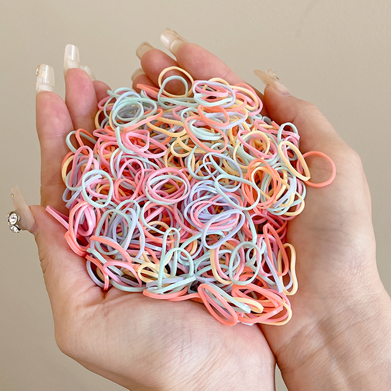 Las bandas de goma desechables de color para niños no dañan el cabello, alta elasticidad y durabilidad