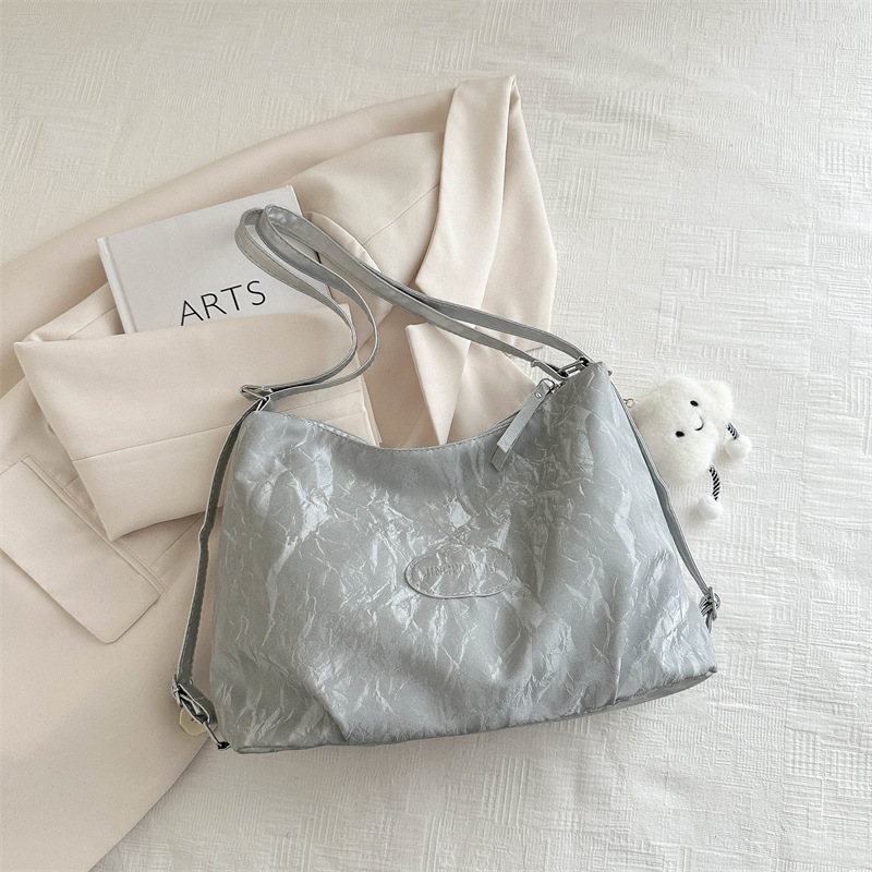 Bolsa de sensación relajada, bolsa de mujer, gran capacidad de verano, 2024, nueva bolsa de viaje de hombro de un solo tipo