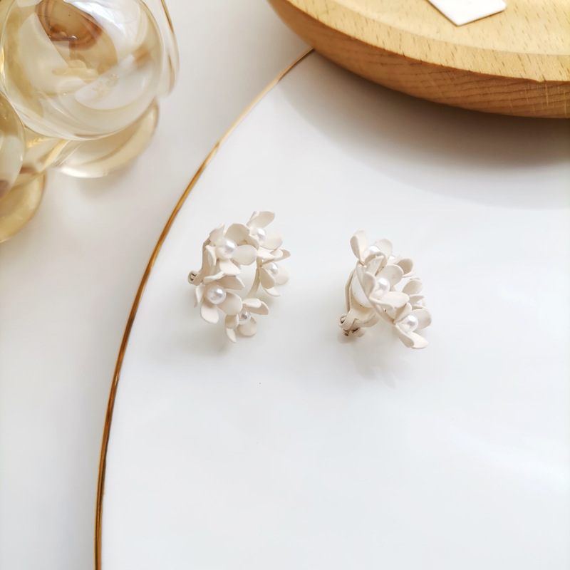 White ear clips