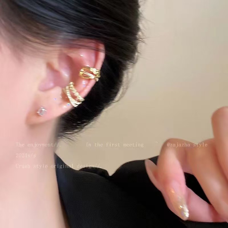 Pinza de hueso de oreja de circón multicapa de viento frío Pendientes de lujo ligero de alta calidad 2025 nuevo estilo explosivo Pendientes de clip de oreja sin orejas perforadas